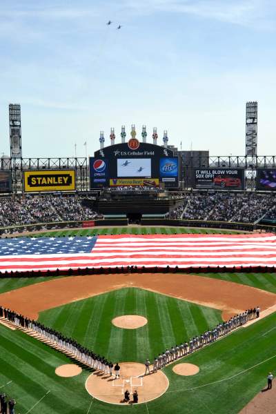 The teams line up pre game at the white sox stadium