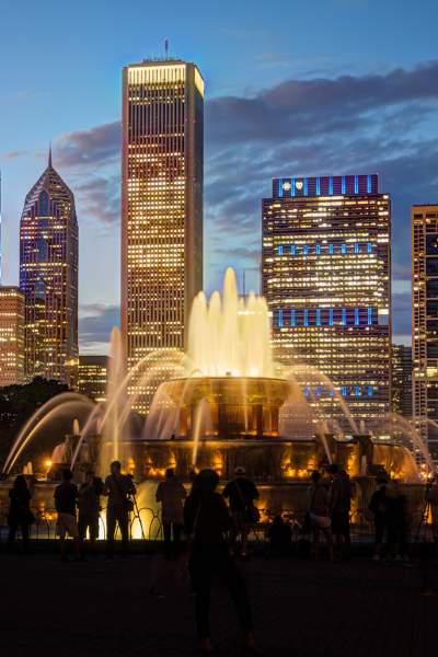 A nighttime image of Buckingham Fountain and the Chicago Skyline
