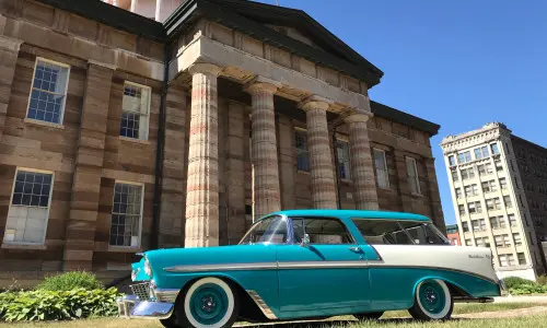 A building and a car