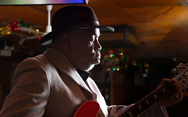 Profile of Lurrie Bell Playing Guitar at Kingston Mines in Chicago