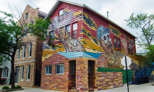 The mural on the outside of the Hector Duarte Studio in Pilsen Chicago