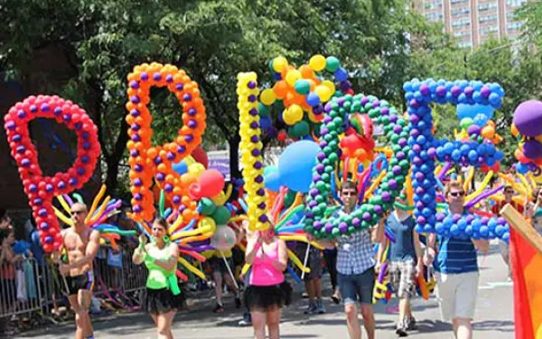 Balloons spelling out 'pride'