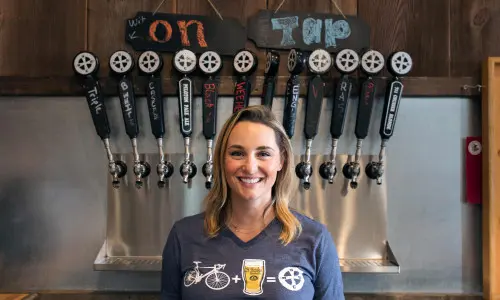 Lady standing in the bar