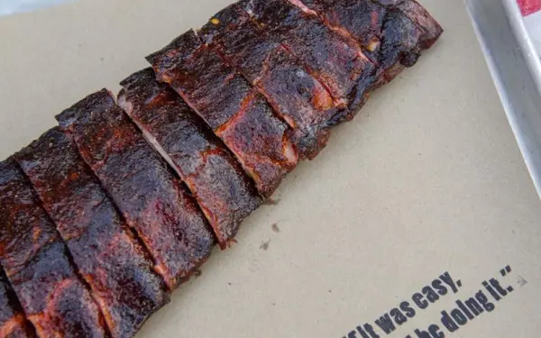 BBQ ribs laid on a tray