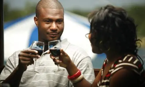 A couple cheers wine 