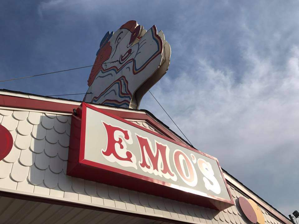 The sign above the entrance of Emo's Dairy Mart in Peoria
