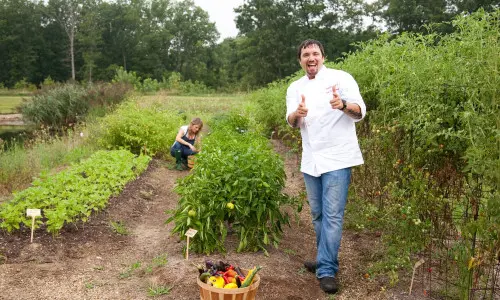The owners of Firefly Grill busy collecting crops