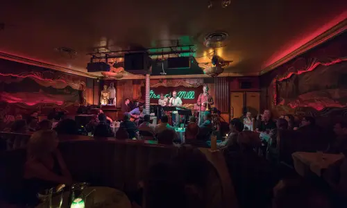 People watch a performance at the Green Mill