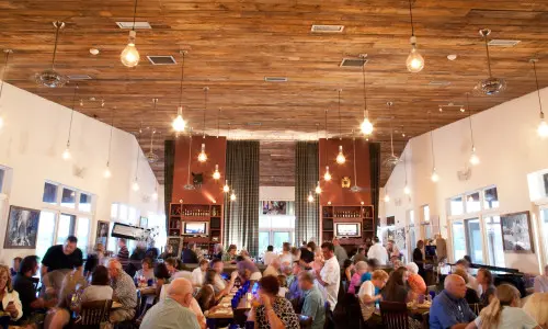 Interior of a restaurant with people dining