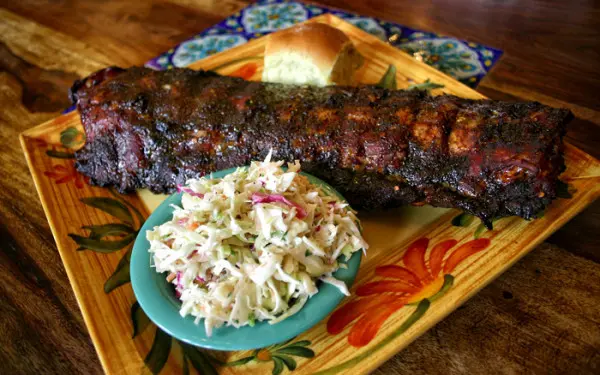 BBQ ribs and a bread roll and slaw