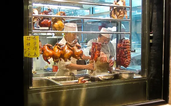 A window front with meat hanging in it on Argyle Street