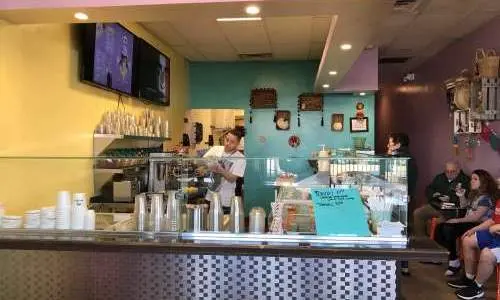 Yellow, pink and blue interior of Yeni's Palarte Mexican Ice Cream.