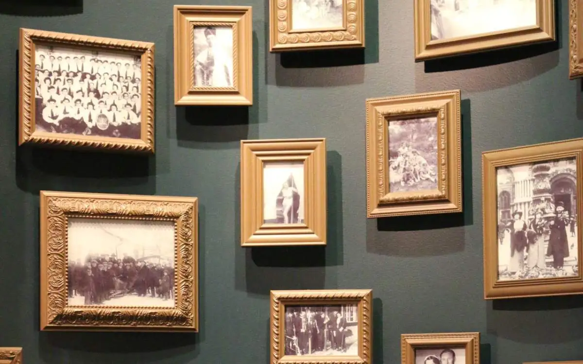 Frames on wall with black and white photos in them