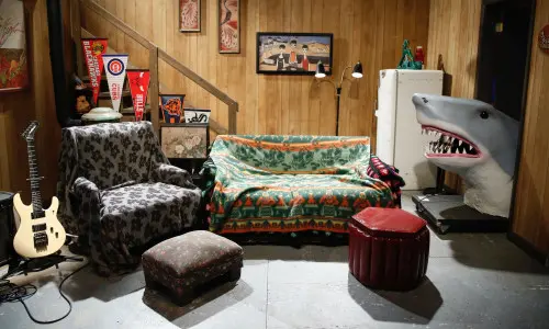 A lounge full of couches and some random stuff