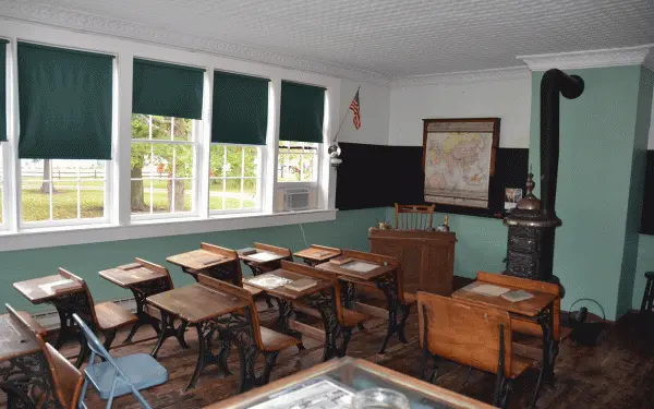 Inside the lovejoy schoolhouse with traditional desks 