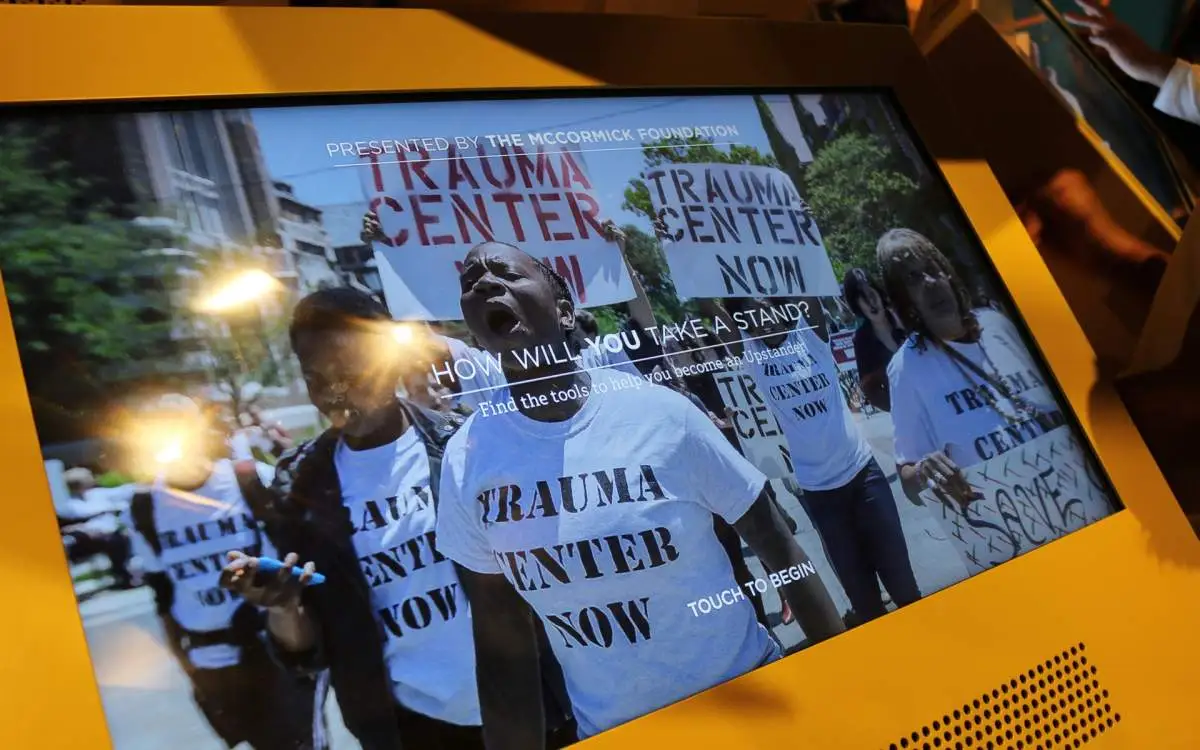 Ipad with picture of people protesting