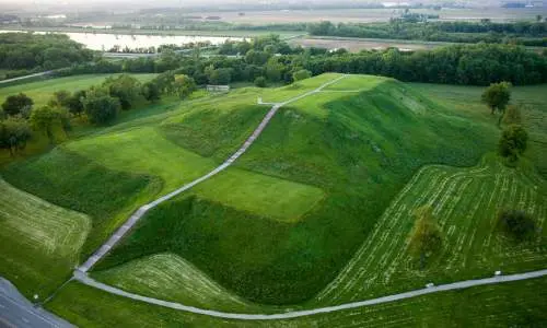 An aerial view of green hills at Cahokia Mounds
