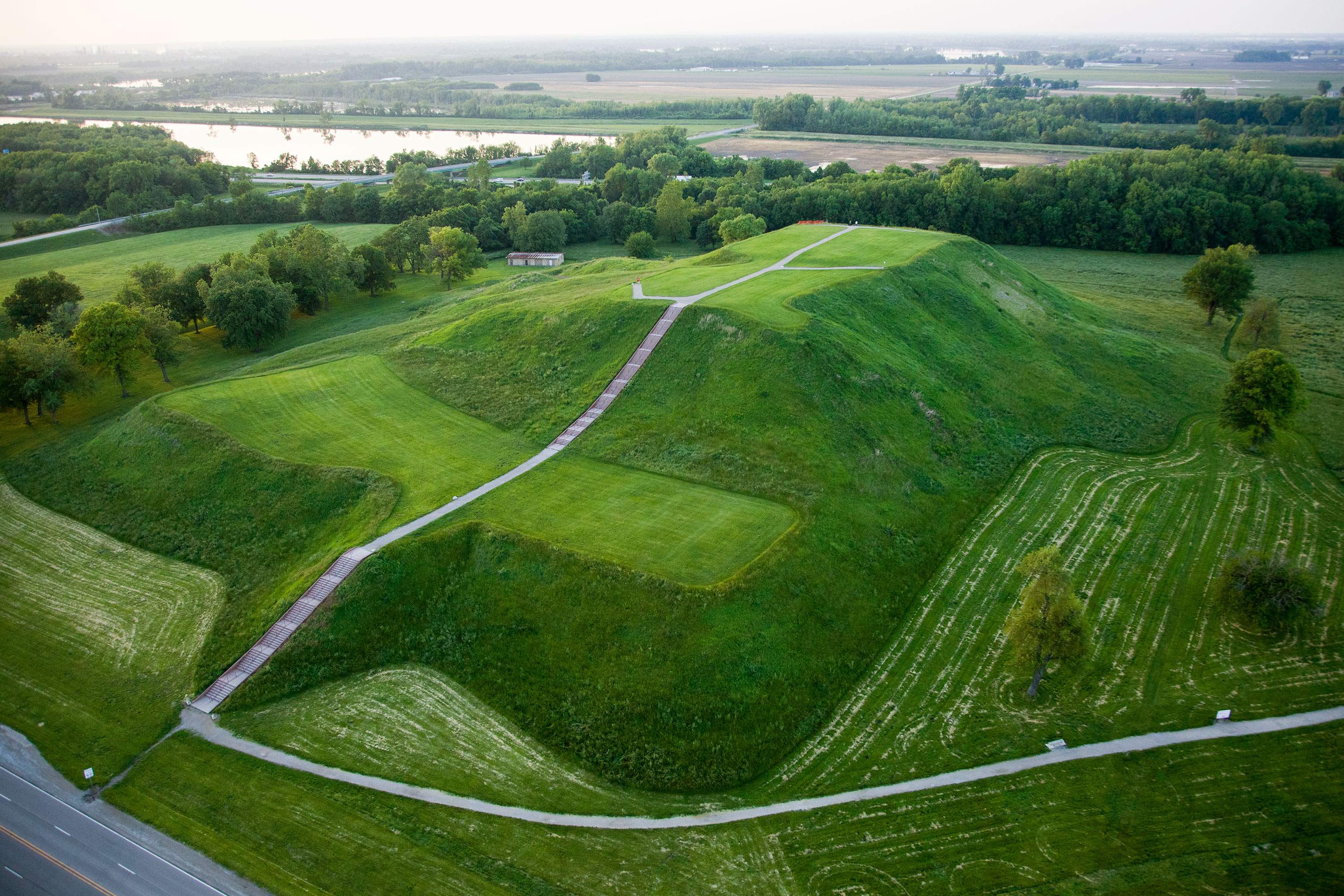 An aerial view of green hills at Cahokia Mounds
