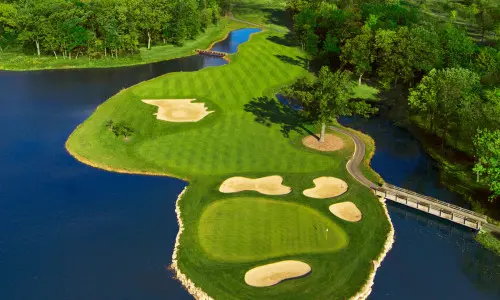 Golf course surrounded by water