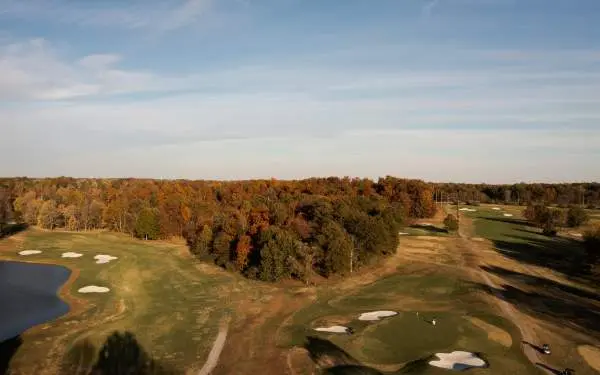 An aerial view of a golf course during the fall