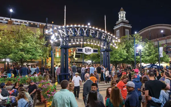 A crowd gathered in the beer garden at Navy Pier socializing