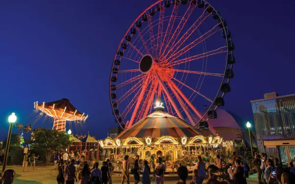 The Ferris Wheel illuminated in the evening