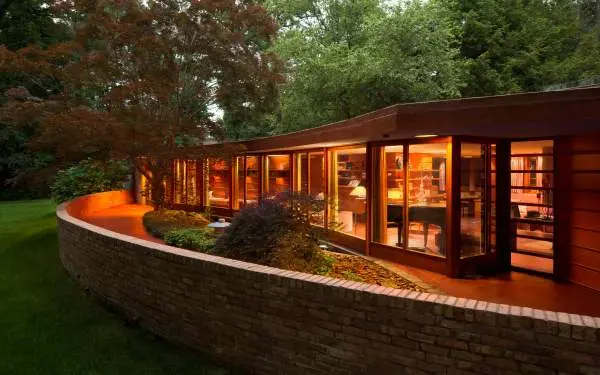 The exterior of a lit house