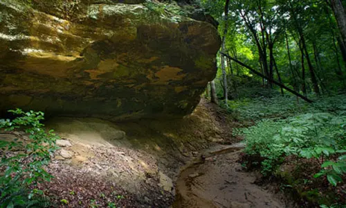A rock cave in the forest