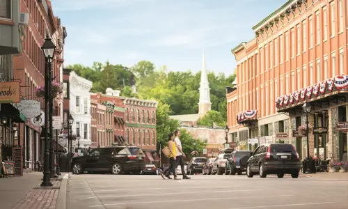 people walking across the street