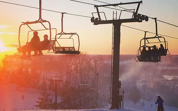 Ski lifts at Chestnut Mountain Resort during winter