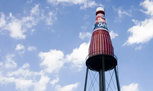 The giant Brooks Catsup Bottle against a blue sky in Collinsville