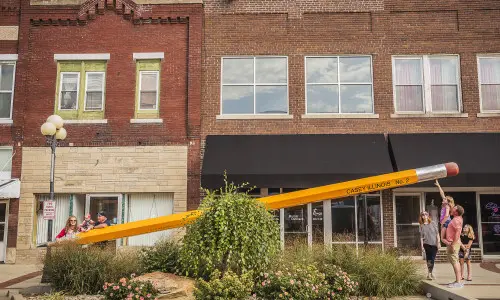 Large pencil attraction with families surrounding it.