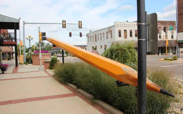 The worlds largest pencil located on the side of the street in casey