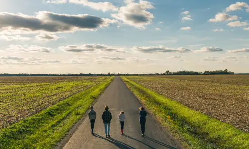 Craig Hensel's family stroll along a country road at the Great Pumpkin Patch, Illinois. 