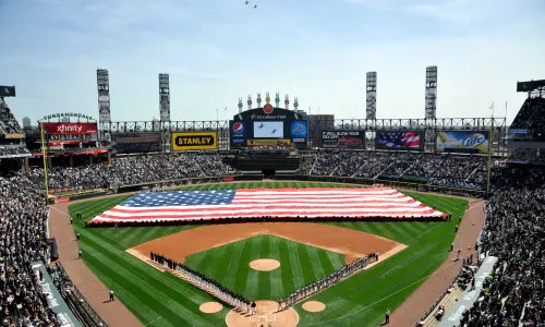 The teams line up pre game at the white sox stadium