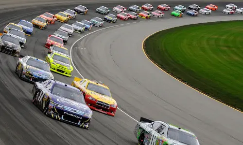 Cars race around the track at Tri City Speedway in Granite City