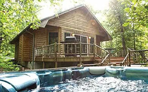 Cozy log cabins for two, at Woodland Cabins in Murphysboro, Illinois. (Photo courtesy of Woodland Cabins.)