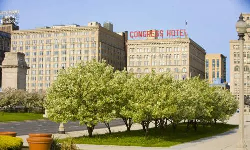 The outside of the Congress Hotel in Chicago during the daytime.