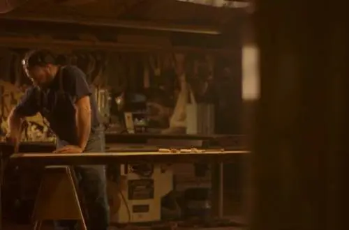 David Stein making handmade furniture in his workshop.