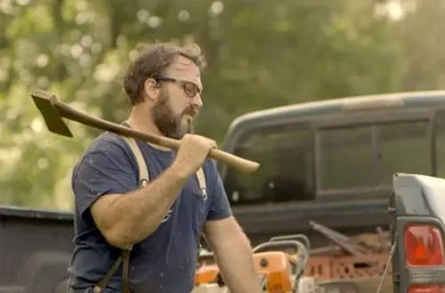 David with an axe heads off to chop wood to mil for furniture.