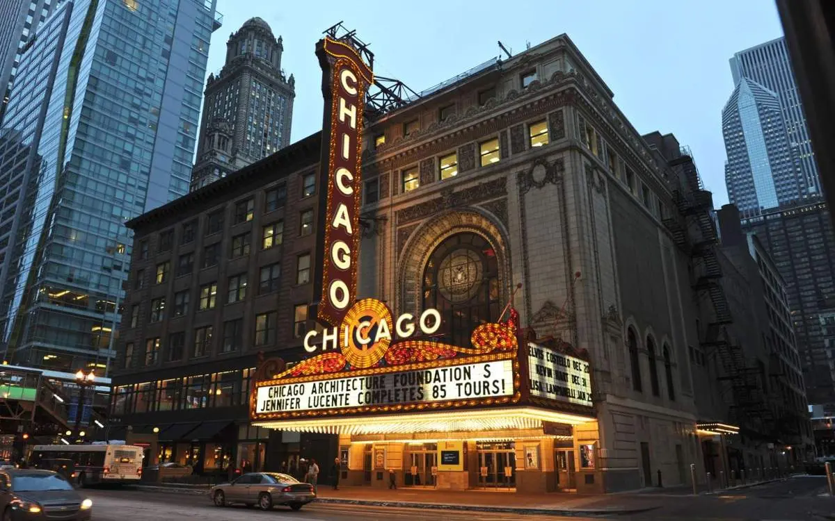 Chicago Theatre's exterior lit up at night.