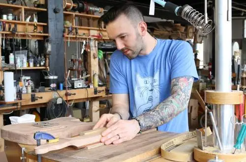 Student learning how to make their own instruments at Specimen Products.