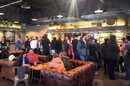 People in a room drinking