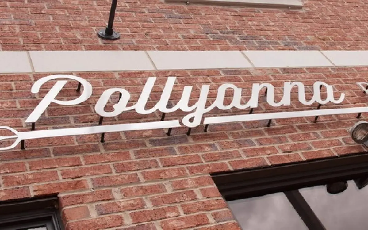 A sign on a brick building