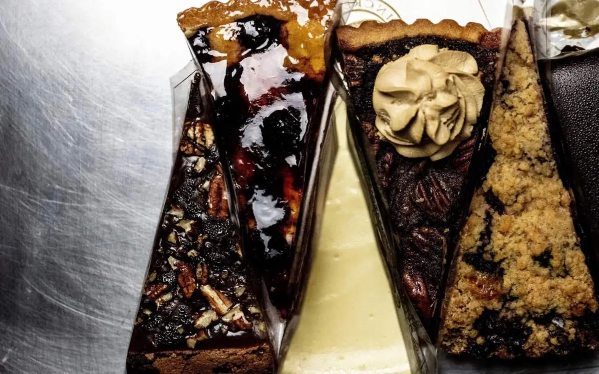 Mutiple slices of fancy cheese cake
