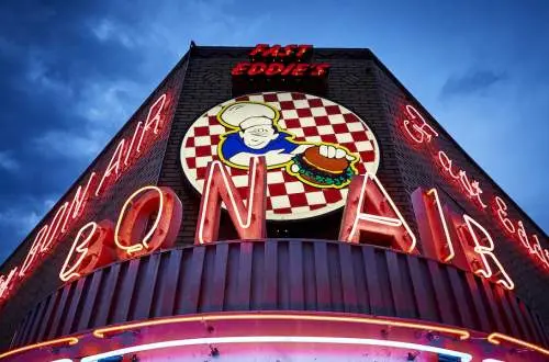 A neon sign for Fast Eddie's Bon Air in Alton