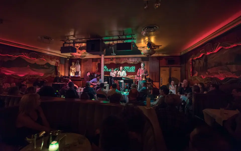 People watch a performance at the Green Mill