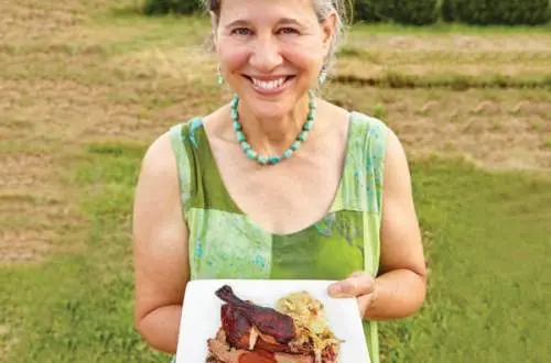 late holding a plate of food