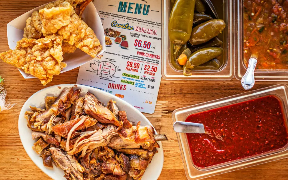 Aerial shot of a value meal at Carnitas Uruapan includes a half-pound of tender carnitas
