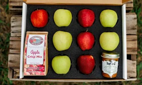 Box of apples and snacks